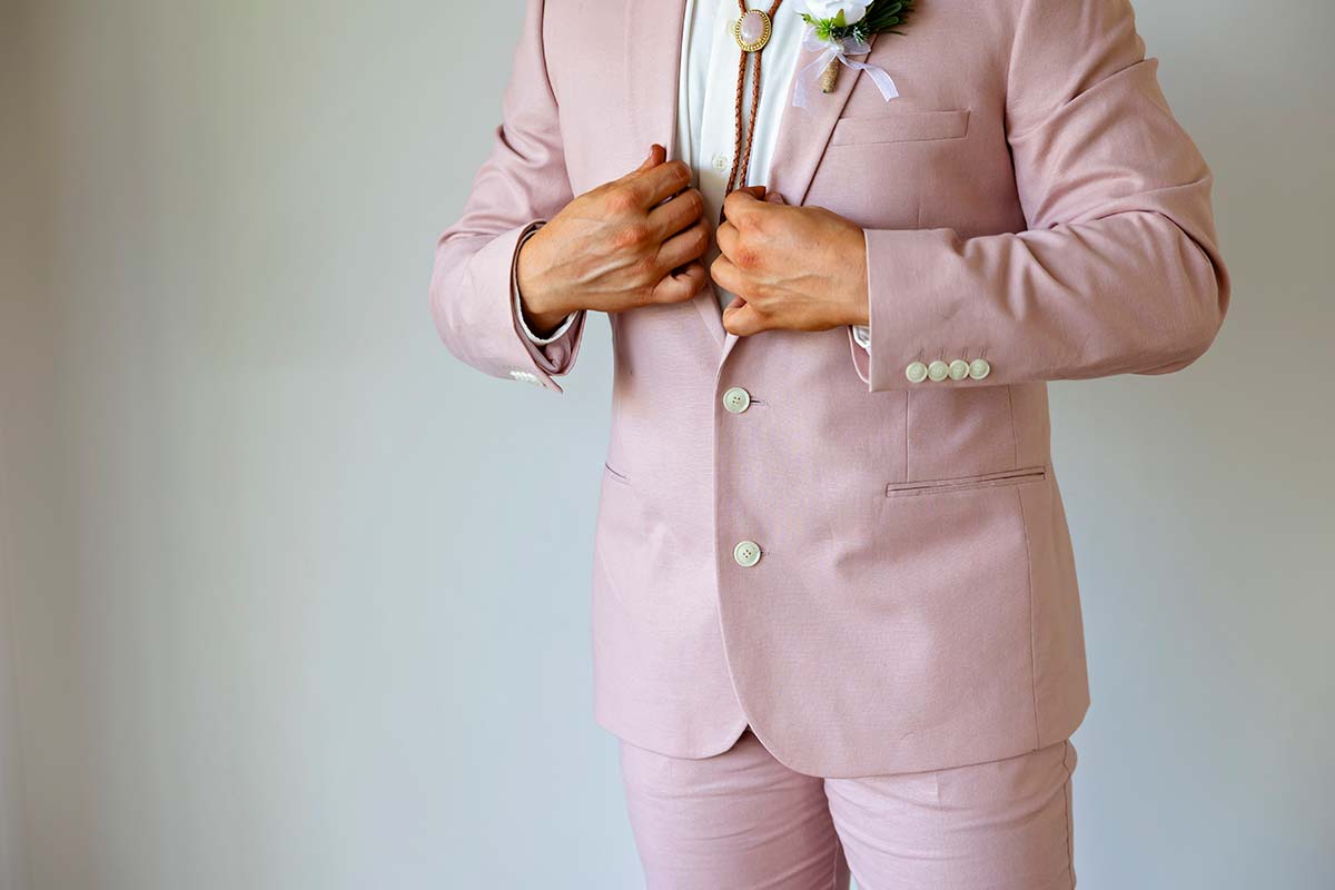 pink suit groom